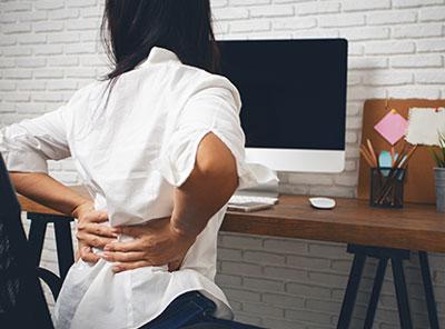 Photo of a Woman Returning to Work After an Injury